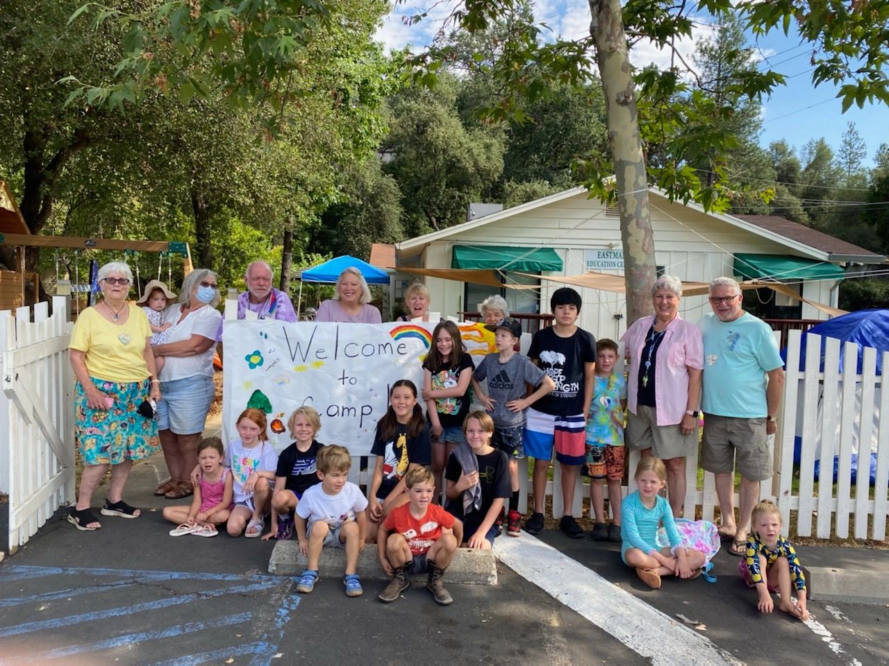 Vacation Bible School group walking on a forest boardwalk